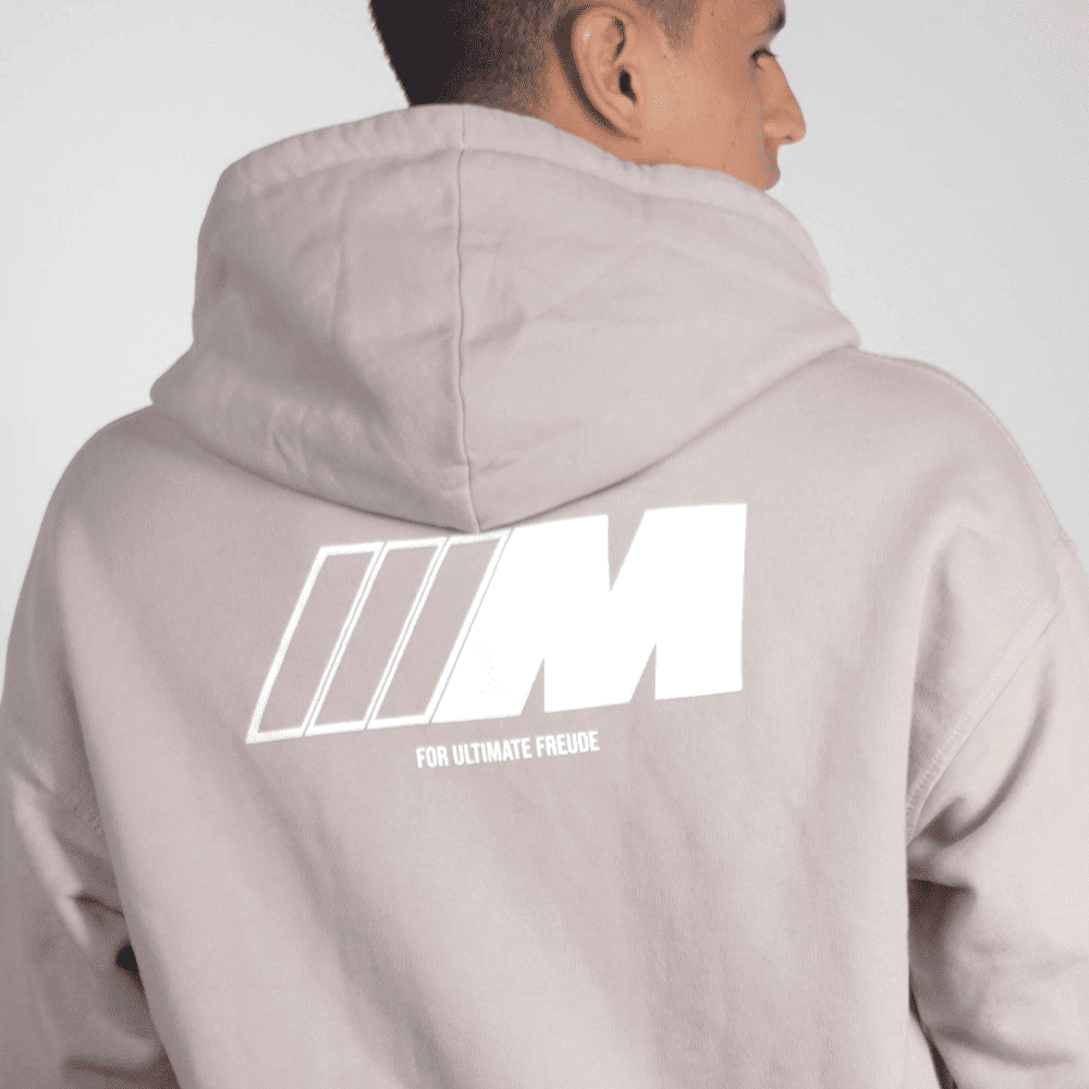 Man wearing logoed hoodie